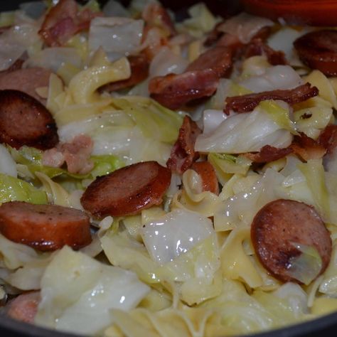 Cabbage and noodles is one of my all time favorite comfort foods. The addition of keilbasa (or smoked sausage) makes this a meal. Warning: once you start eating it ... it's hard to stop!! Cabbage Noodles, Cabbage And Noodles, Kielbasa Recipes, Cabbage And Sausage, Braised Cabbage, Sausage Dishes, Fried Cabbage, Breakfast Delicious, Kielbasa