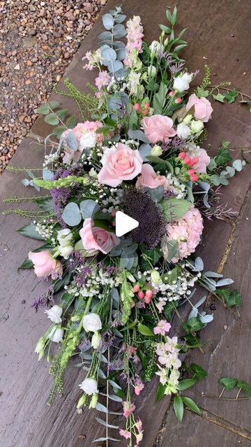 Simply Flowers on Instagram: "Crafting heartfelt tributes at our flower shop!  Watch us create a stunning country-style double-ended funeral spray with Sweet Avalanche roses, pink hydrangea, larkspur, trachelium, gypsophila, white eustoma, and snapdragons. Delicate pastel hues harmonize with lush eucalyptus, ivy, soft ruscus, aralia and thlaspi for a serene touch.   Each arrangement is a unique expression of sympathy and remembrance. Honouring the beauty of life and the warmth of memories.   #FloralTribute #SympathyArrangement #CountryStyleFlowers" Flower Arrangement With Eucalyptus, Stunning Flower Arrangements, Sympathy Flower Arrangements, Soft Ruscus, White Eustoma, Country Flower Arrangements, Floral Centrepiece, Sympathy Arrangements, Rose Flower Arrangements