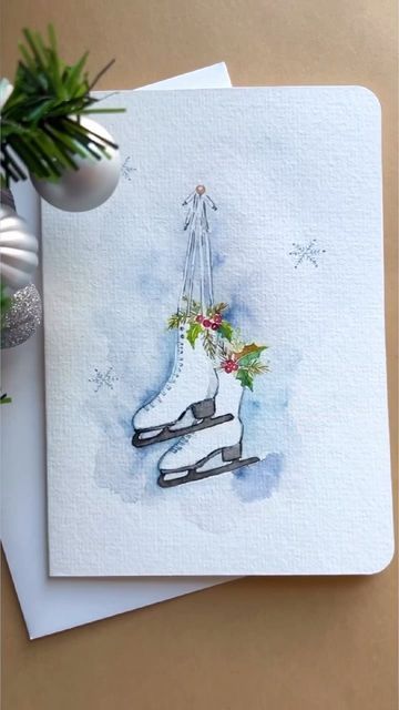 Seema on Instagram: "Another winter element - ice skates Watercolors 52 set @paulrubensart Brushes @goldenmapleart Watercolor Card @funtoart #traceswithpalacios hosted by Tracy @tracesofwater & Lea @palacios.paints And #holidayhappinessseries hosted by Sharon @simplyartfulcottage #reelsinstagram #reels #reelsvideo #goldenmapleart #artistsoninstagram #watercolorpainting #watercolorillustration #watercolorartist #holidayhappinessseries #watercolor_painting #paintingoftheday #paintingprocess #arttutorialsforbeginners #loosewatercolor #funtoart #iceskates #holidayseason" Ice Skating Watercolor, Watercolor Sled, New Years Watercolor, Christmas Card Watercolor Ideas, Mini Watercolor Paintings, Painted Ice Skates, Ice Skate Christmas, Ice Skate Drawing, Christmas Skating