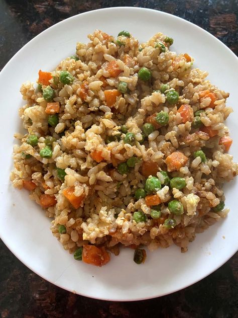 Fried Brown Rice is a delicious side dish or base for a filling dinner. Add vegetables and fried egg for plenty of protein and fiber. You'll love this flavorful rice. Leftover Brown Rice Recipes This dish is a fantastic way to use any leftover brown rice you might have in your fridge. It adds so much flavor and is a kid-friendly way to add more vegetables to your meal. Just sauté with oil, garlic, and soy sauce! And this dish just builds in flavor, making a great option for batch-prepping ... Egg Fried Brown Rice, Brown Rice Fried Rice, Fried Brown Rice Recipes, Leftover Brown Rice Recipes, Batch Prepping, Brown Rice Side Dish Recipes, Leftover Brown Rice, Potato Salad With Eggs, Brown Rice Side Dish