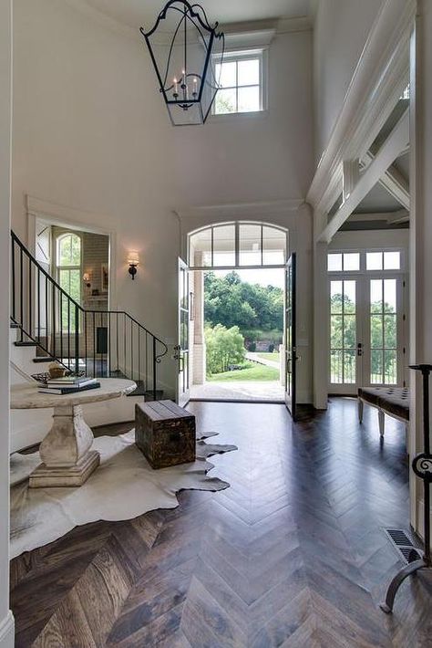 Small Basement Remodeling, Herringbone Floors, Herringbone Wood Floor, Herringbone Wood, Glass French Doors, French Country Living Room, Light Wood Floors, Lots Of Windows, Grand Foyer