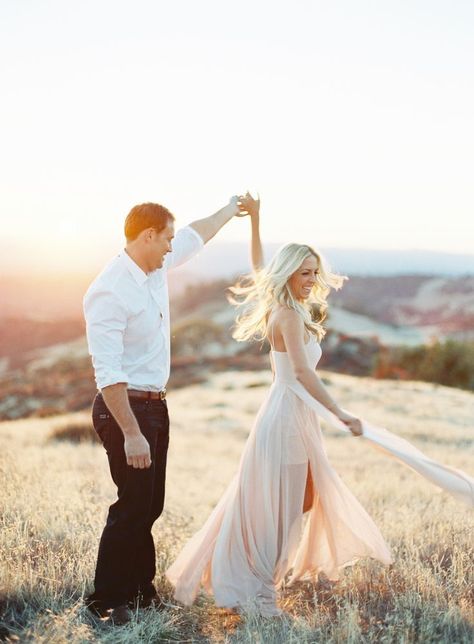 Twirling Engagement Photos, Twirl Engagement Photo, E Shoot Ideas Engagement Photography, Flowy Dress For Engagement Pictures, Spinning Engagement Photo, Engagement Photos Flowy Dress, Couple Twirling Photo, Spinning Couple Picture, Couples Spinning Photo