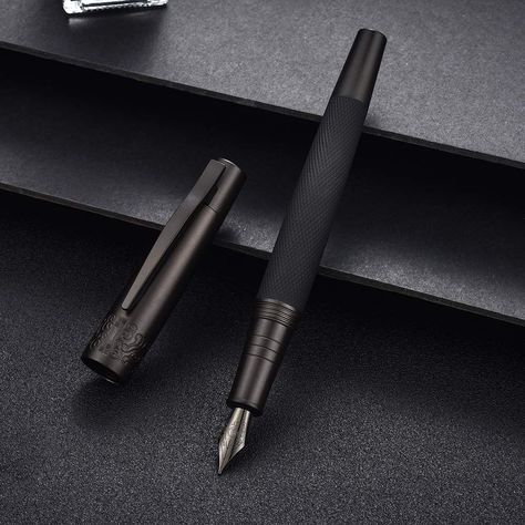 PRICES MAY VARY. ✅ High Quality -- This general fountain pen features durable brass barrels and cap, premium brushed matte finishes, and polished accents that render pure sophistication. ✅ Classic Style -- Well-designed, carefully-crafted, mysterious black colored metal fountain pen. ✅ Smoothly Writing -- It is equipped with a PVD coated black steel fine nib to deliver an incomparable writing experience. ✅ Well-Balanced -- The weight of pen is carefully calculated and much more suitable for long Matte Black Accessories, Tree Textures, Color Pen, Luxury Pens, Metal Pen, Pure Black, Bottled Ink, Ink Toner, Pen Case