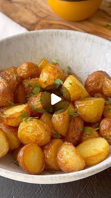 @eatinghealthytoday on Instagram: "Crispy Mini Potatoes 🥔 
(via: @michi_blog)
 
Ingredients: 
1 kg of halved mini potatoes or regular peeled potatoes cut into medium cubes 
1 teaspoon baking soda or baking powder 
1/3 cup olive oil 
1/4 cup chopped parsley salt 

Directions:
1. In a large pot, boil the potatoes completely covered with water. Add baking soda and a teaspoon of salt to the water. Cook at a medium boil for about 12 minutes or until softened but not falling apart. 
2. Heat the oven to 220 degrees turbo. 
3. Drain the potatoes and transfer to a pan. Pour olive oil on top and a teaspoon of salt, mix well and transfer to the oven. 
4. Bake for about 40 minutes or until completely golden.." Crispy Mini Potatoes, Crispy Roast Potatoes, Mini Potatoes, Mini A, Dinner Sides, British Food, Side Recipes, Veggie Sides, Large Pots