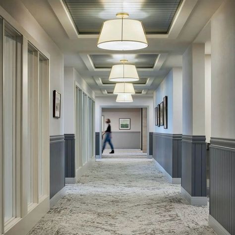 Smolder and Aperture are picture perfect in this gorgeous senior living community designed by @/oandostudio
📸 @/joshgrowth

Developer: @/matteraa
Architect of Record: @/thrive_architects
Design Architect: @/galbraithcarnahan
GC: @/catalystbuilds

#seniorlivingdesign #seniorlivinginteriors #commercialflooring #modularcarpet #commercialinteriors #hospitalitydesign Condo Lobby Design, Assisted Living Decor, Condo Lobby, Senior Living Interior Design, Senior Living Design, Kitchen Feature Wall, Senior Living Facilities, Hotel Hallway, Medical Office Design