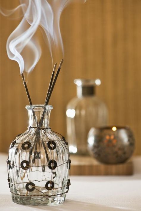 To rid your home of negative vibes, try carefully burning some incense. This fragrant smoke has long been a spiritual and meditation practice — so why not try it at home? Our expert says it'll help create a calm and serene atmosphere. Click through for more ways to remove negative energy from your home. Negative Energy Cleanse, Energy Muse, Feng Shui Energy, Nag Champa, Feng Shui Tips, Removing Negative Energy, Clear Negative Energy, Energy Cleanse, Holistic Living