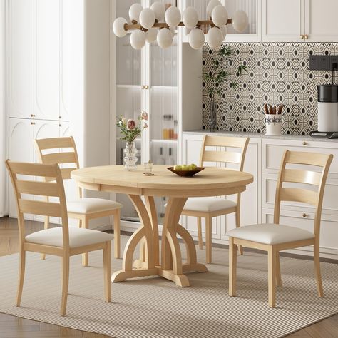 PRICES MAY VARY. [Farmhouse Dining Furniture Set] - Retro-style dining set, Perfect for the whole family to enjoy a sumptuous dinner together. With a strong farmhouse feel, this dining set creates a romantic and elegant atmosphere for your dining room. [5-Piece Kitchen Dining Set] - This elegant round dining set includes a round table and four matching chairs, showcasing a classic silhouette accentuated by a banded arch pedestal. [Extendable Round Dining Table Set] - This exquisite round table c Farmhouse Round Kitchen Table, Table Of 4, Extendable Round Dining Table, Light Wood Kitchens, Coastal Dining Room, Round Dining Table Sets, Round Kitchen Table, Kitchen Table Wood, Farmhouse Kitchen Tables