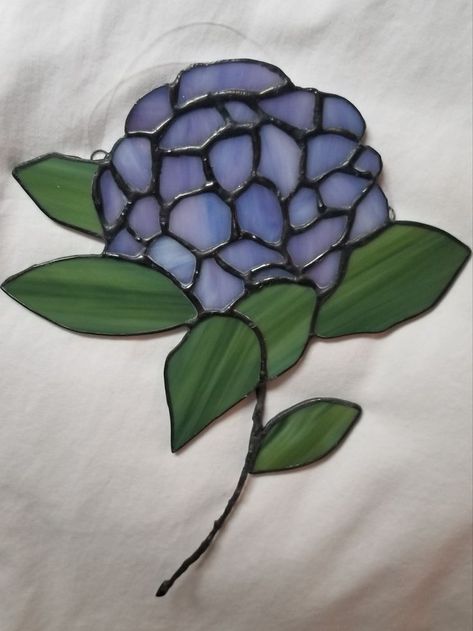 It all started with the perfect piece of glass, I saw it and new it needed to become a hydrangea; It has blues with hints of pinks and purples. Stained Glass Rose, Window Stained, Stained Glass Patterns Free, Stained Glass Suncatchers, Stained Glass Flowers, Stained Glass Diy, Stained Glass Crafts, Stained Glass Designs, Faux Stained Glass