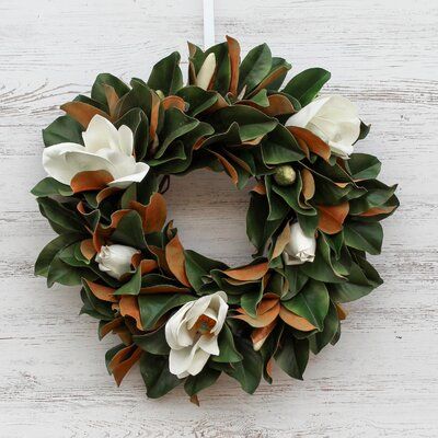 This wreath is the perfect statement piece for the front door, wall, or above the mantle in your home! Our wreaths also make an excellent gift that can be enjoyed for years to come! | Gracie Oaks Real Touch 24" Polyvinyl Chloride (PVC) Wreath Traditional Faux in Green/White, Size 24.0 H x 24.0 W x 4.0 D in | Wayfair Magnolia Wreaths, All Season Wreath, Magnolia Wreath, White Magnolia, Magnolia Leaves, Flower Arranging, Polyvinyl Chloride, Seasonal Home Decor, Front Door Wreath