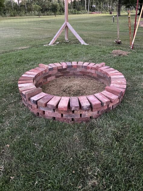 Repurposed brick into a firepit #firepitideas #firepitbackyard #repurposedbrick #repurposedmaterial Brick And Stone Fire Pit, Small Brick Fire Pit, Fire Pit Out Of Bricks, Reuse Bricks Ideas, Brick Bonfire Pit, Brick Paver Fire Pit, Bombfire Ideas, Things To Do With Bricks, Brick Firepits Backyard Diy