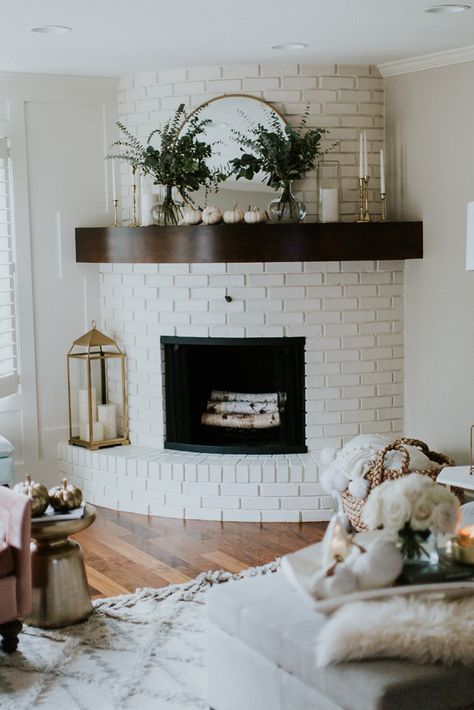 Sharing my simple, and affordable tips on how to decorate your home for fall using pumpkins, candles and greenery (both indoors and outdoors)! Corner Brick Fireplace, Curved Fireplace, Fireplace Decor Ideas, Kitchen Interior Modern, White Brick Fireplace, Cella Jane, Building House, Corner Fireplace, Fireplace Ideas