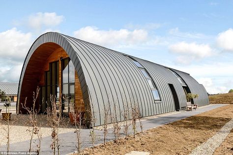 The former light aircraft hangar in rural Essex is a far cry from the days of rationing - having been given a Grand Designs-style makeover to modern eco standards. The property is known as The Zinc House because of its roof. Nissen Huts were designed to be temporary structures that could be assembled by a team of six men in four hours Quonset House, Hangar House, Hangar Home, Hangar Homes, Hut Design, Quonset Homes, Quonset Hut Homes, Arched Cabin, Zinc Roof