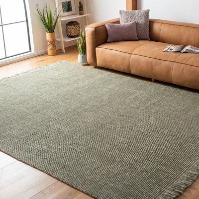 Green Rug Living Room, Light Gray Couch, Green Couch Living Room, Apartment Rugs, Fringe Rugs, Green Couch, Solid Color Rug, Rug Inspiration, Green Sofa