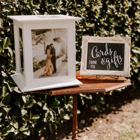 Your guests will more than likely come to the wedding bearing gifts, so it should go without question that a gift table definitely needs a place in your overall wedding day décor. With a beautiful presentation, you’ll not only create a striking moment, but you’ll leave very little room for guests to be left wondering: Where should I put this gift? Wedding Card Box Ideas Diy, Unique Wedding Card Box Ideas, Wedding Welcome Table, Wedding Gift Card Box, Diy Card Box, Gift Table Wedding, Money Box Wedding, Unique Wedding Cards, Card Table Wedding