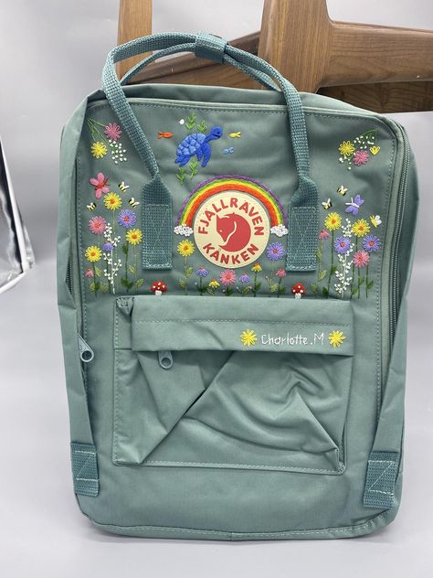 https://www.etsy.com/listing/1404584750/fjallraven-kanken-no-1-backpack-custom?ref=listings_manager_grid Embroidery On Backpack, Kanken Sling Bag, Backpack Embroidery, Flower Hand Embroidery, Stitch Backpack, School Bag Essentials, Embroidered Backpack, Embroidered Shoes, Embroidery On Clothes