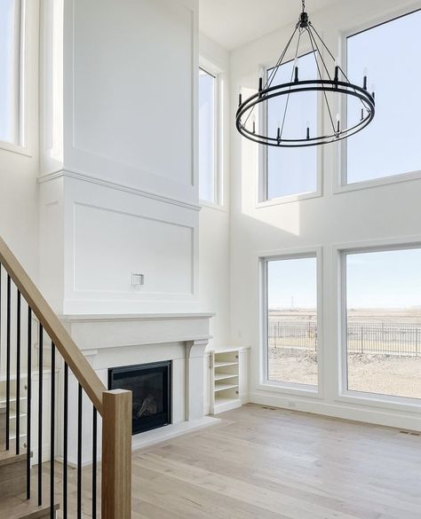 White Fireplace Vaulted Ceiling, 2 Story Living Room Molding, Two Story Fireplace With Windows, Walk Around Fireplace Living Rooms, 18ft Ceiling Living Room, Living Room With Tall Fireplace, 2 Story Great Room Ideas Fireplace, Floor To Ceiling Fireplace With Tv, Tall Wall Fireplace Ideas