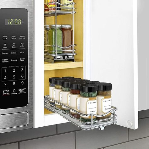 Clever Spice Rack Ideas That Will Quickly Tame Your Kitchen Clutter Slide Out Spice Rack, Slide Out Shelf, Spice Storage Solutions, Spice Cabinet Organization, Inside Kitchen Cabinets, Wall Spice Rack, Spice Rack Organization, Pull Out Spice Rack, Spice Organizers