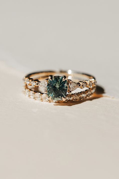 sapphire engagement ring, eternal harmony Green Sapphire Engagement Ring With Wedding Band, Green Sapphire Wedding Ring Set, Ethical Diamond Engagement Ring, Beach Inspired Engagement Rings, Green Sapphire Engagement Ring Oval, Beach Engagement Rings, Sapphire Engagement Ring Green, Round Oval Engagement Ring, Green Sapphire Rings