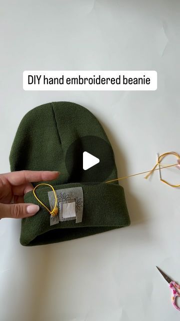 Jessy | Hand Embroidery Patterns + Courses | DIY Name Sweater on Instagram: "This project is actually SO simple! All you need is:

🩵A beanie with a square logo
🩵DMC embroidery floss @dmc_embroidery 
🩵Size 5 embroidery needle
🩵This pattern- comment BEANIE for the link or head to my website and browse our Fall patterns" Embroidered Carhartt Beanie Diy, Hand Embroidered Carhartt Beanie, Embroidered Beanie Diy, Beanie Embroidery Ideas, Embroidered Carhartt Beanie, Carhart Beanie, Name Sweater, Carhartt Beanie, Stocking Hat