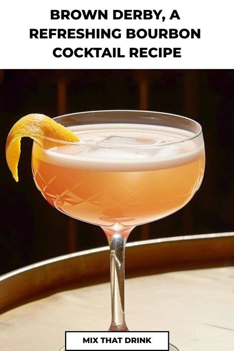 Looking to elevate your summer cocktail game? The Brown Derby cocktail is a must-try! This refreshing drink combines bourbon, grapefruit juice, and honey syrup for the perfect balance of sweet and tangy flavors. Whether you're hosting a backyard BBQ or relaxing by the pool, this classic cocktail is sure to impress your guests. Shake one up today and sip on summertime goodness with every delicious sip of a Brown Derby cocktail! Brown Derby Cocktail, Derby Recipe, Bourbon Cocktail Recipe, Party Food Bar, Whiskey Recipes, Most Popular Cocktails, Bourbon Cocktail, Brown Derby, Bourbon Drinks