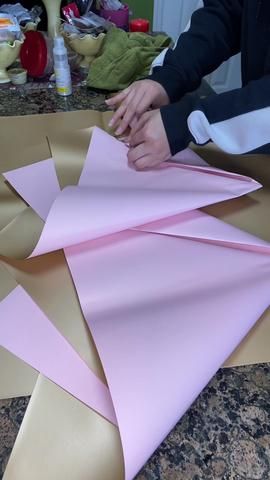 How to fold paper for a bouquet💐 #flowerwrapping #flowerwrappingtutor... | how to wrap a bouquet | TikTok How To Fold Bouquet Paper, How To Wrap Money Bouquet, How To Fold Paper For Flower Bouquet, How To Wrap A Bouquet, How To Wrap A Bouquet In Paper, Wrap A Bouquet, Wrapping Tutorial, Folding Money, Diy Bouquet Wrap