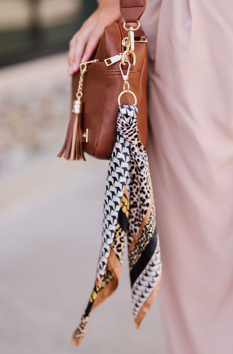 Pair the silky-soft Breanna Keychain with your keys or bag, or add the scarf to accessorize your hair. We love a multitasker. Details: 15” long Scarf Keychain, Scarf On Bag, Bag Accessories Keychain, Boho Keychain, Keychain Purse, Purse Scarf, Satin Scarf, School Jewelry, Silk Accessories