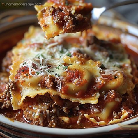 This Crockpot Ravioli Lasagna is a hearty and easy-to-make dish. Layered with cheese ravioli, ground beef, and rich pasta sauce, it's perfect for a satisfying family dinner. Easy Crockpot Ravioli Lasagna Recipe, Slow Cooker Ravioli Casserole, Crockpot Cheese Ravioli Recipe, Lasagna Soup Recipe Crockpot Ground Beef, Ravioli In The Crockpot, Crockpot Ravioli Lasagna Crock Pot, Ravioli Lasagna Soup, Easy Crockpot Ravioli Lasagna, Ravioli Recipe Crockpot