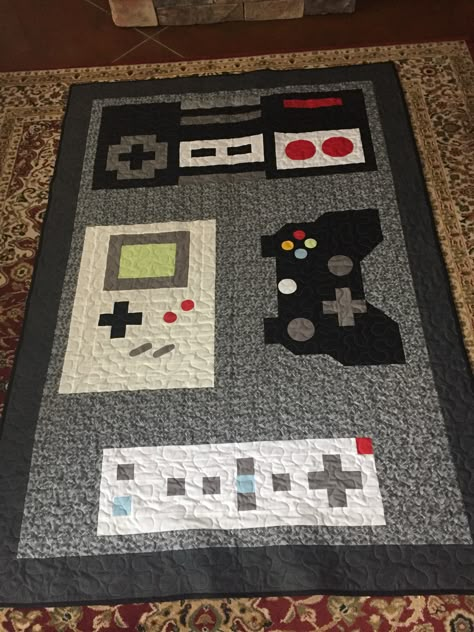 Nintendo, Gameboy, Xbox and Wii controller quilt Gaming Quilt Patterns, Gamer Crochet Blanket, Video Game Quilt, Video Game Quilt Pattern, Gamer Quilt Ideas, Nintendo Quilt, Gamer Quilt, Video Game Controller Cross Stitch, Leftover Fabric Crafts