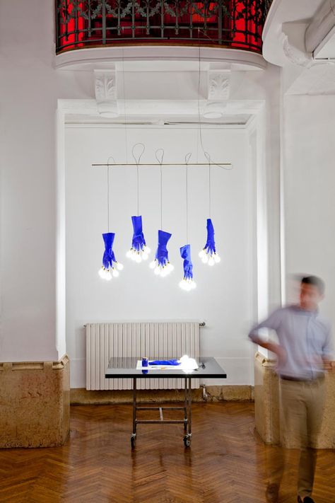 ingo maurer's luzy lights illuminate the fingertips of plastic gloves Furniture Rendering, Plastic Gloves, Chinese Crafts, Ingo Maurer, Fantasy House, Diy Lamp, Retail Space, Blue Colour, Lamp Design