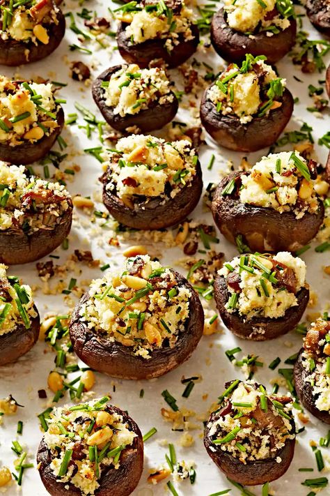 Herb- and Goat Cheese-Stuffed Mushrooms Goat Cheese Stuffed Mushrooms, Cheesy Appetizer, Cheese Stuffed Mushrooms, Stuffed Mushroom, Finger Foods Easy, Holiday Side Dishes, Cheese Stuffed, Thanksgiving Appetizers, Holiday Appetizers