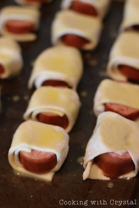 Puff Pastry Kielbasa Sausage Rolls on cookie tray ready to go in the oven Sausage Roll Ups, Sausage Rolls Puff Pastry, Sausage Roll, Kielbasa Sausage, Skip To My Lou, Parchment Paper Baking, Puff Pastry Sheets, Cookie Tray, Sausage Rolls