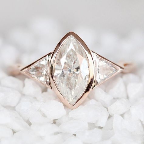 Hopelessly devoted to this Marquise and her friends, the diamond triangles all bezel set! Custom all diamond ring. Sold. ⁣… Marquise Diamond Ring Settings, Marquise Wedding Ring, Bezel Set Diamond Ring, Pretty Engagement Rings, Hopelessly Devoted, Marquise Diamond Engagement Ring, Marquise Diamond Ring, Silver Wedding Ring, Bezel Engagement Ring