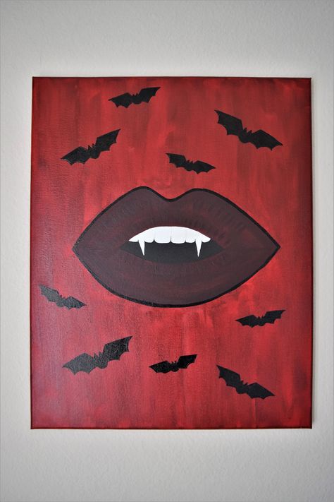 This is an original acrylic painting made by me, Sierra Miller. It is of very deep cherry vampire lips with cute little black bats around it. This painting is on a 20"X16" stretched canvas.  I started out painting by sketching out the lips. I then mixed together a very beautiful deep red to make it a nice dark vamp lip. Once I was done with the first layer for the lip, I then went in and painted the background a blood-red. after that was done, I then went back in on the lips. Painting a few more Painting On Black Background Ideas, Aesthetic Painting For Room, Diy Halloween Art Canvas, Painting Ideas Red Background, On Canvas, Spooky Easy Painting Ideas, Gothic Painting Ideas On Canvas Easy, Halloween Small Paintings, Horror Paintings Easy Canvas