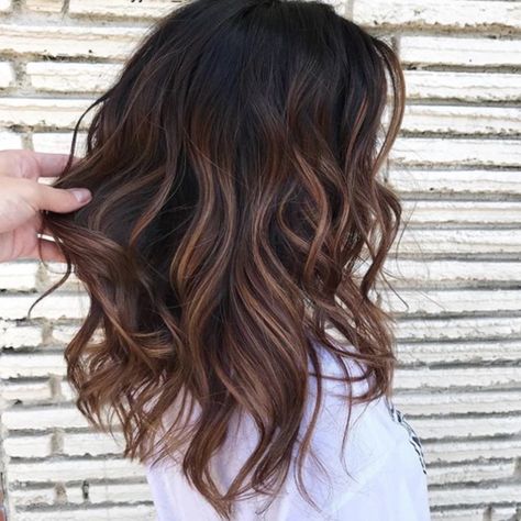 Hairstyles That Will Make You Look Younger | For an energetic hairstyle, give these romantic waves a try. This lively, inviting look is all about embracing natural beauty. So, put away the curling iron, and let your curls do the work. #beautytips #southernliving #hair #hairstyle Warm Brunette Hair Color, Hair Color Brown Chestnut, Going Dark, Chestnut Brown Hair, Rambut Brunette, Chestnut Hair, Chestnut Hair Color, Balayage Blonde, Winter Hair Color