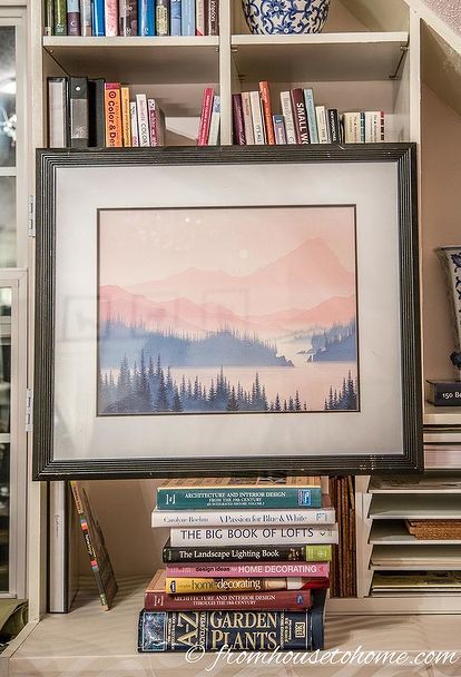 how to hang art on a bookshelf and still have easy access to the books Bookcase Decorating, Ikea Toy Storage, Tv Nook, Headboard Art, Craft Room Organization Diy, Hang Pictures, Faux Brick Walls, Folded Book Art, Hang Art