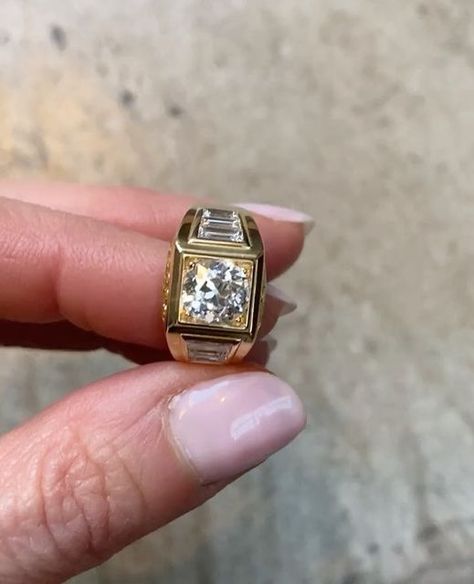 Hattie Rickards 💎 HRJ 💎 on Instagram: "🌟 SHIMMER 🌟⁠ ⁠ @lucywilliams02 s glittering HRJ engagement ring. Look at that antique round diamond sparkle!⁠ ⁠ I placed the central brilliant cut in a square setting to create a bold silhouette. Flanking it with more minimal modern step cut baguettes adds a courageous elegance. The channel set yellow sapphires bring a soft radiant glow. Perfectly reflecting Lucy in a ring!⁠ ⁠ Thank you @thecutlondon for this gorgeous video.⁠ ⁠ ⁠ #bespokeengagement #eng Lucy Williams Engagement Ring, Chunky Engagement Ring, Cool Engagement Rings, Bold Engagement Rings, Square Diamond Ring, Engagement Rings Channel Set, Big Engagement Rings, Square Engagement Rings, Square Diamond Rings