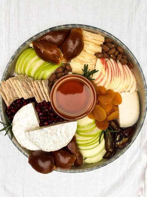 A Rosh Hashanah Cheese Board Is Calling Your Name - Alma Rosh Hashanah Traditions, Holiday Brisket, Rosh Hashana Recipes, Round Challah, Becoming Vegetarian, Jewish Foods, Holiday Cheese Boards, Yom Teruah, Closet Desk