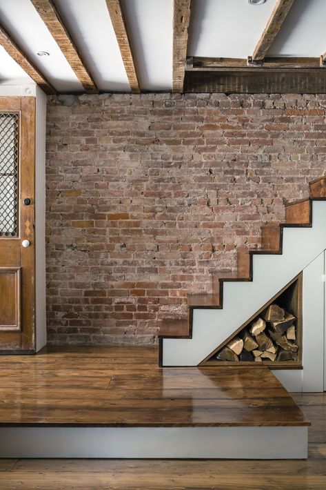 Staircase and Wood Tread Some floorboards and stair treads were salvaged from a farmhouse.  Photo 164 of 656 in Best Staircase Photos from An Ad Copywriter Edits His Manhattan Row House—and Finds a New Calling Decor Under Stairs, Brick Staircase, Under Stairs Closet, Stairs Closet, Under Stairs Storage Solutions, Space Under Stairs, Upstairs Landing, Upper Manhattan, Brick Interior