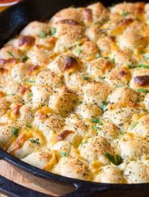 Cheesy Garlic Pull Apart Bread Recipe | A Spicy Perspective Easy Pull Apart Bread, Cheesy Garlic Pull Apart Bread, Queso Dips, Garlic Monkey Bread, Pull Apart Cheese Bread, Garlic Pull Apart Bread, Cheese Pull Apart, Bread Pull Apart, Cheesy Pull Apart Bread