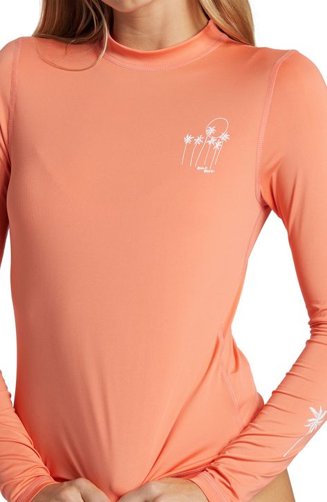 A relaxed fit makes it easy to get into this long-sleeve rashguard designed to protect you from the sun's rays. 23" length (size Medium) Crewneck Long sleeves UPF 50+ sun protection 87% polyester, 13% elastane Machine wash, tumble dry Imported