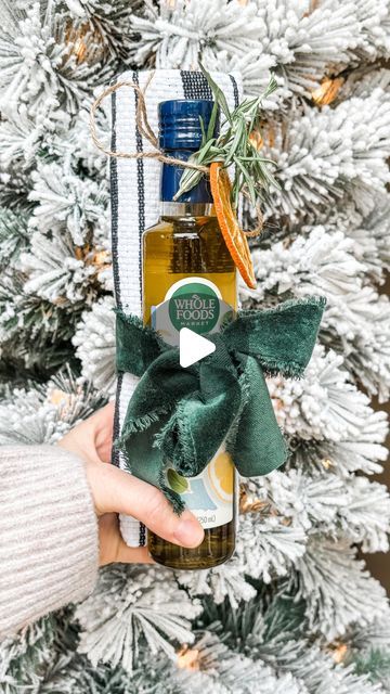 Heather on Instagram: "🎄✨Happy Gifting - PART 6✨

Here’s a last minute idea for the hostess that you can grab on your next grocery run! 

Bring a pretty bottle of olive oil with a dish towel. I found this lemon infused one at my Whole Foods for under $10. 🍊 🍋

Merry merry! ❤️" Olive Oil Christmas Gift, Olive Oil Gift Ideas, Olive Oil Gift, Bread Gifts, Dipping Oil, Unique Gift Wrapping, Olive Oil Bottles, Oil Gifts, Christmas Gift Basket