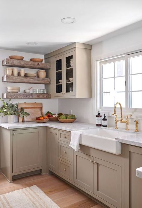 a taupe farmhouse kitchen design against white walls Neutral Small Kitchen Ideas, Modern French Country Backsplash, Small Beige Kitchen Ideas, Beige Country Kitchen, Beige Shaker Kitchen, Neutral Painted Kitchen Cabinets, Light Taupe Kitchen Cabinets, Kitchen With Cream Cabinets, 70s Kitchen Remodel