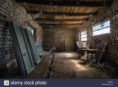 Old barn interior in the village. Vintage shed built of wood and brick, abandoned barn. Inside of a rustic stable Stock Photo Soviet Building, Shed Homes Interior, Abandoned Room, Brick Shed, Wood And Brick, Brindleton Bay, Texture Reference, Shed Interior, Old Abandoned Houses