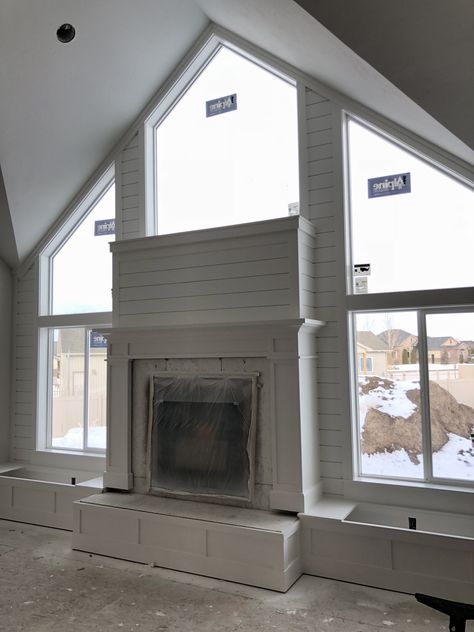 Shiplap fireplace surrounded by windows. Side built in benches with storage. Window Above Fireplace, Fireplace Between Windows, Fireplace Windows, Above Fireplace, Tall Fireplace, Cabin Fireplace, Fireplace Frame, Shiplap Fireplace, Fireplace Built Ins