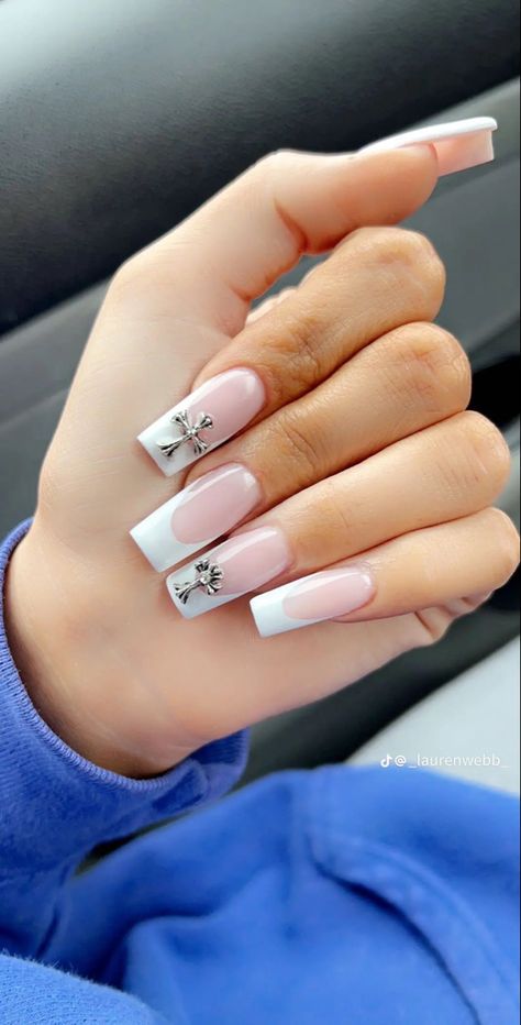 White French Tip With Charms, Black Cross French Tip Nails, Black French Tip Nails With Cross Gem, French Tip With Cross Charm, French Tip Nails With Cross Charm, White French Tip With Cross Charm, Black French Tips With Cross Charms, French Tip Acrylics, Long Almond Nails