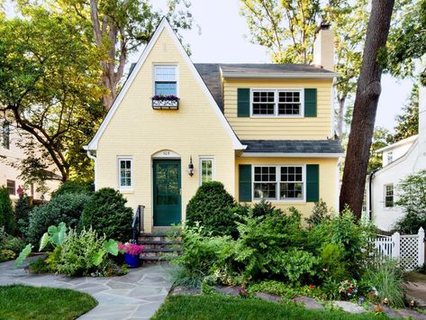 1937 quaint English cottage vibe in Benjamin Moore Golden Lab + B.M. Lafayette Green + B.M. Atrium White. Yellow House Exterior, Shutter Colors, Exterior Color Palette, Yellow Paint Colors, Green Shutters, Design Café, Outdoor Remodel, Yellow Doors, Yellow House