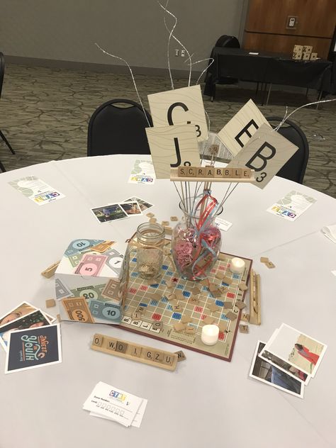 Board Game Themed Gala Game Themed Table Decor, Family Game Night Centerpieces, Game Themed Centerpieces, Board Games Theme Party Decorations, Board Game Table Centerpieces, Trivia Table Decorations, Game Night Table Decor, Game Night Prom Theme, Board Game Bridal Shower Theme