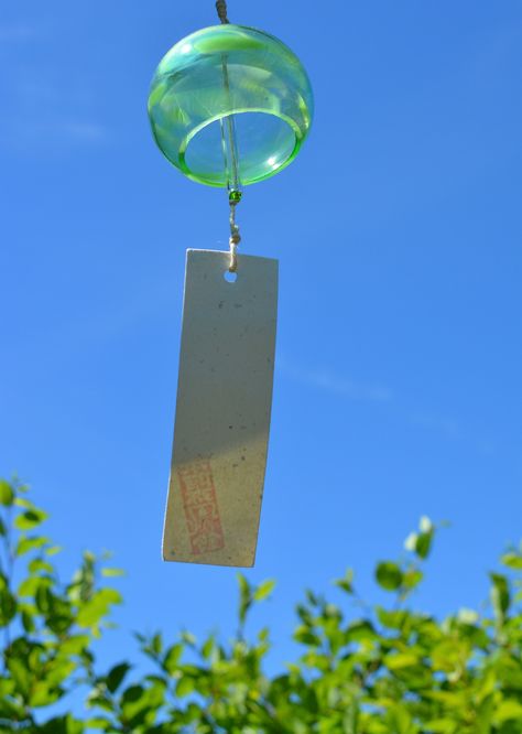 GREEN round HONAMI furin windchime  currently offering ✨ free shipping ✨ to orders to the US & Canada.  The Furin dates back to the Edo period in Japan. Each have a unique gentle chime which is said to be very relaxing. Hang outside, on your deck, or even in a window inside. Made from handblown glass, glass beads and handmade WASHI paper. Made in studio in Glen Williams, Canada     Each chime has a slight different sound - if you would like to hear the sound - please visit  instagram.com/studio_ Japanese Wind Chimes, Christmas Labels, Glass Fish, Edo Period, Washi Paper, Wind Spinners, Japanese Garden, The Sound, Handmade Paper