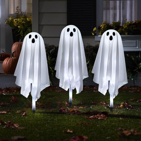 PRICES MAY VARY. Light-up Ghost: Set of 3 ghost Halloween pathway lights have white fabric cloth and spooky faces with black felt eyes and mouths. They cast fearful glow into the night, shining cool white color emanate through their ethereal sheets to level up the Halloween atmosphere. Glowing Halloween Props: Light up your haunted pathway with our ghost pathway marker. Best viewed during nights since they light up and emit a cool white ghastly glow with 8 lighting modes and 15 LEDs in total. Pe Halloween Pathway Lights, Cloth Ghost, Light Up Ghost, Pathway Decor, Halloween Hanging Ghost, Trick Or Treat Party, Glow Halloween, Ghost Decor, Felt Eyes