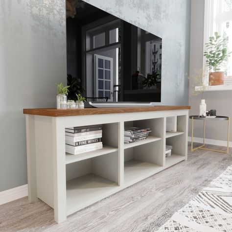 Simple lines and minimalist style abound in this TV stand for up to 80" TV's. Open concept storage and a cord management port are ideal for displaying the newest electronics and family mementos while keeping everything neat and tidy. Homemade Tv Stand, Simple Tv Stand, Storage Entertainment Center, Bookshelves With Tv, Wood Media Console, Farmhouse Tv, White Bookshelves, Farmhouse Tv Stand, Furniture Movers